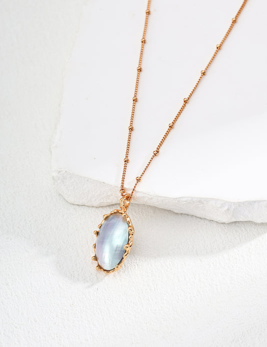 Mabe pearl pendant necklace with oval blue mabe pearl and gold-tone chain