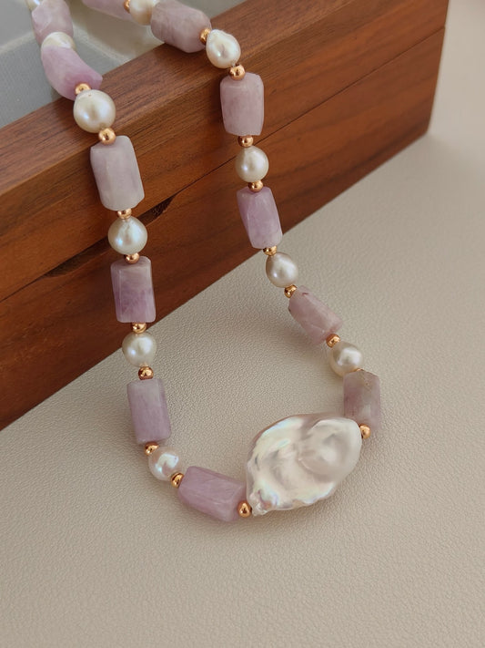 Baroque pearl and kunzite necklace with lavender stone bars, white pearls, gold accents