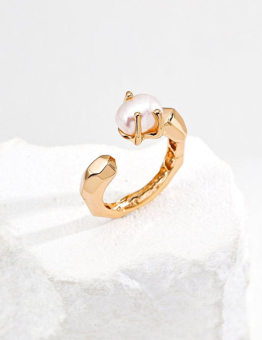 Gold-tone baroque pearl open ring, front view with wrapped band details