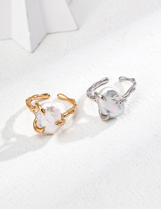 Pair of statement pearl rings: vintage gold and silver with iridescent baroque pearls