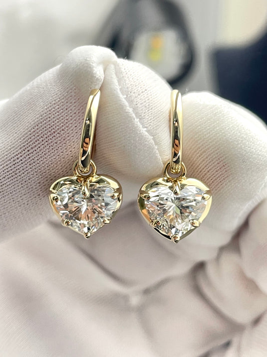Heart-shaped lab diamond drop earrings, gold-tone side view with hoops