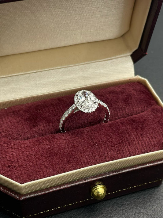 Oval lab diamond halo ring with split band details, oval center stone, ring box view