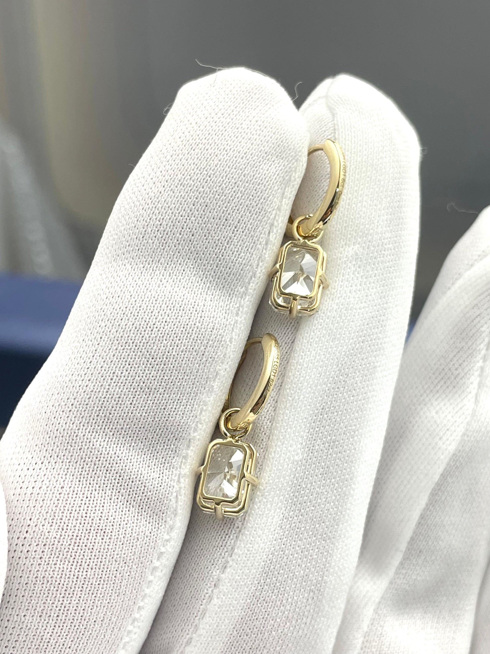 Gold-tone diamond drop earrings with square bezel and hoop link, small drop stones