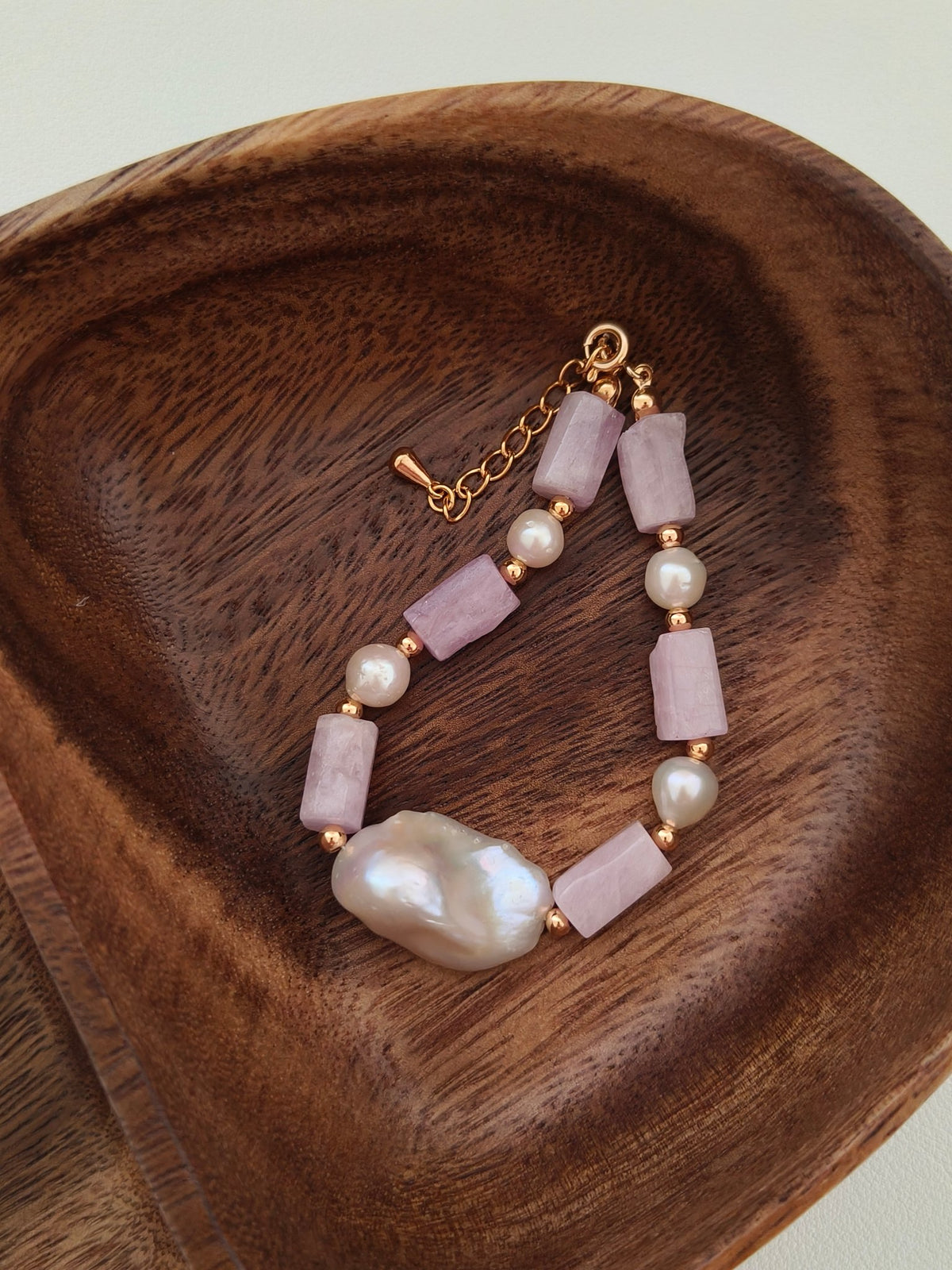Purple stone and pearl bracelet with gold chain and large bar elements