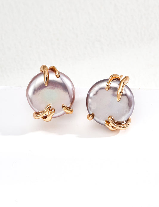 Purple Edison pearl hoop earrings with gold-tone hinges, side angle