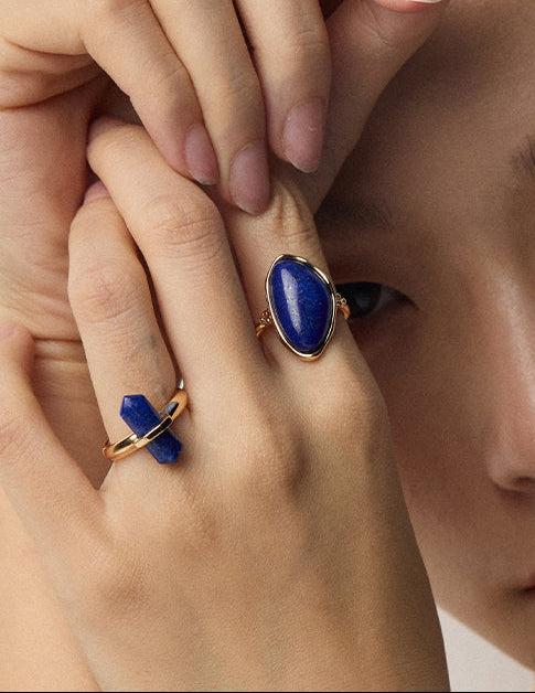 Gold oval cabochon ring with blue lapis lazuli and slim band