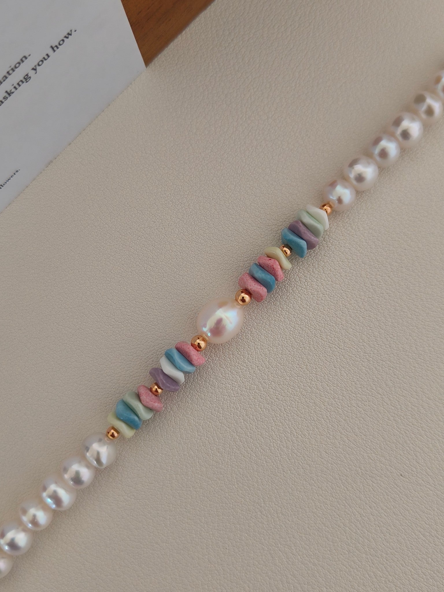 Freshwater pearl bracelet close-up with pastel stacked stone beads