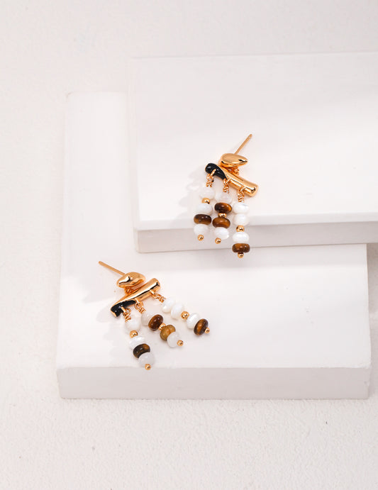 Gold-tone drop earrings with white pearl and tiger eye bead rows