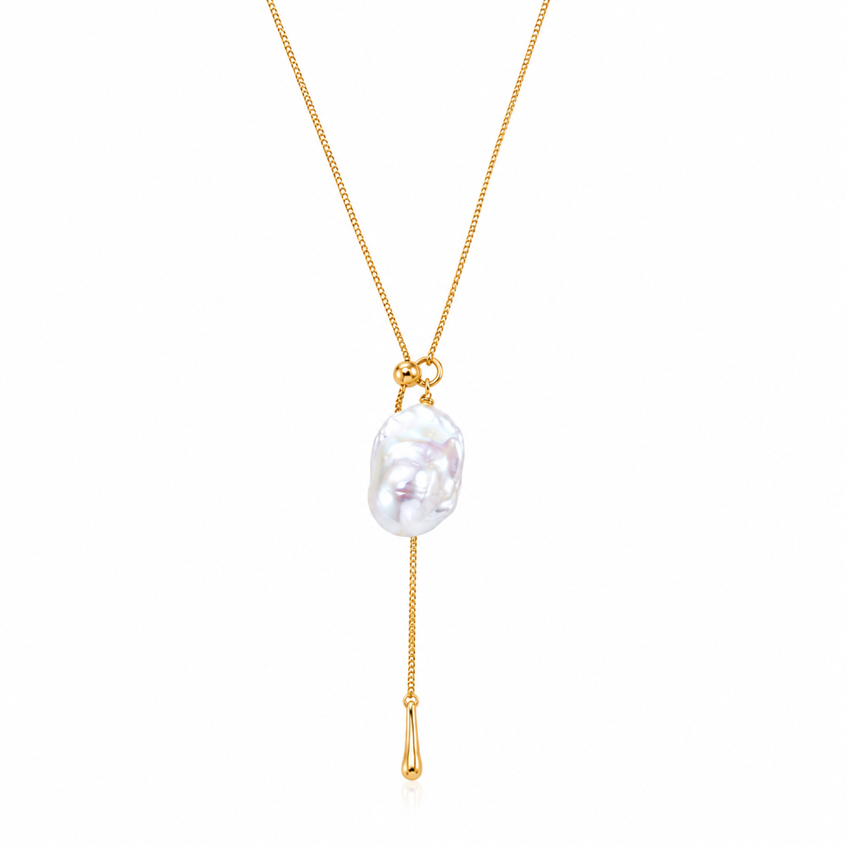 Gold adjustable baroque pearl pendant necklace with circular clasp and tassel drop