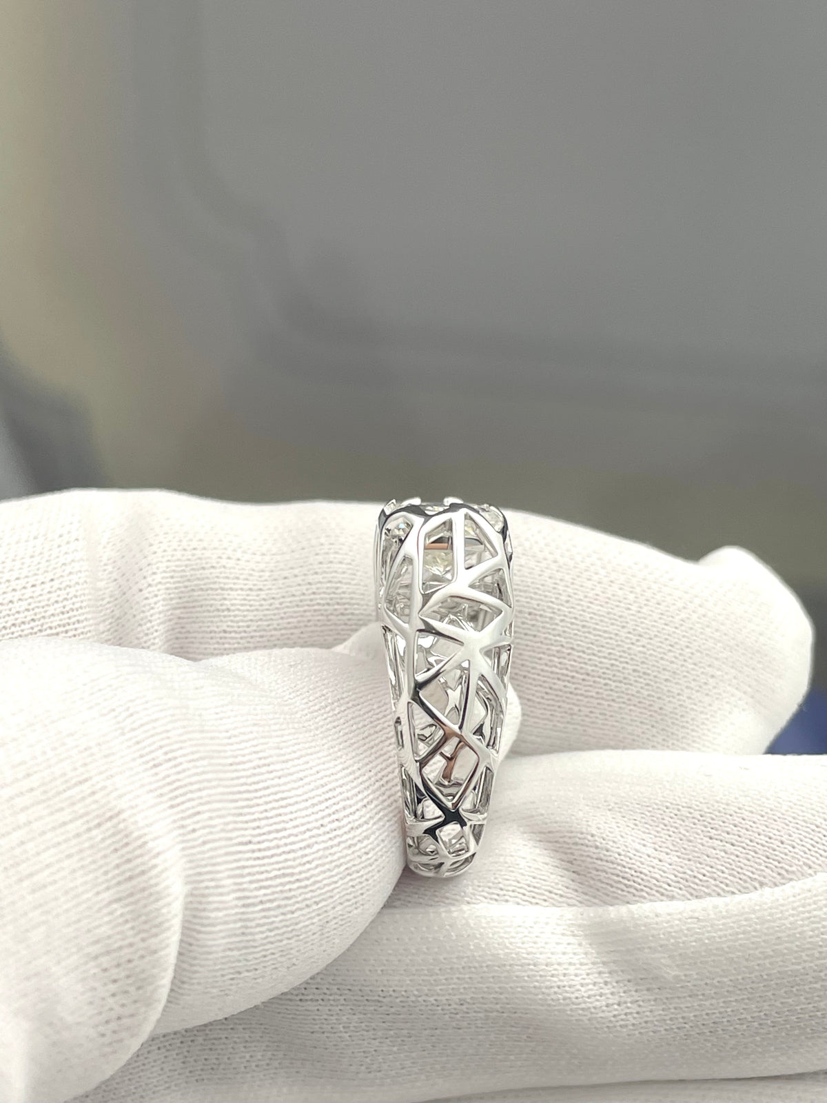 Silver-tone lab diamond ring with geometric prong-set design