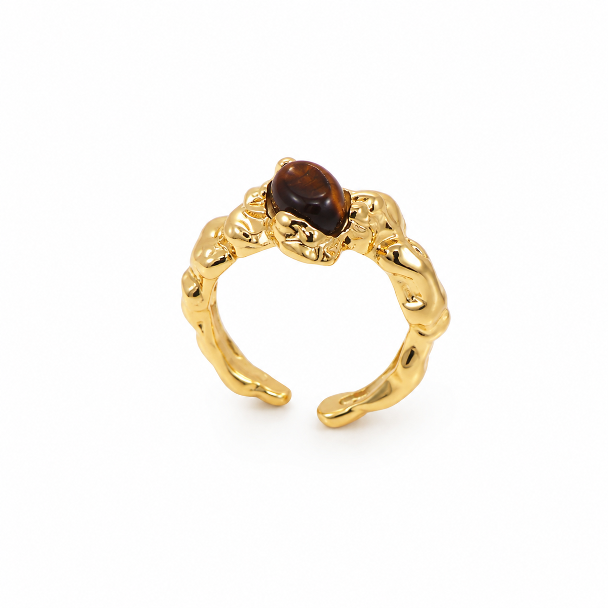 Gold-tone statement ring with dark tiger eye cabochon and ornate rope band