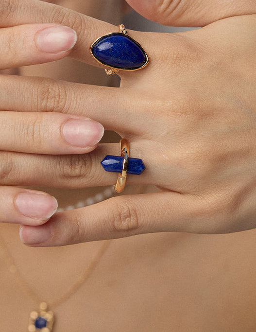 Gold ring with blue lapis lazuli oval top and matching square stone