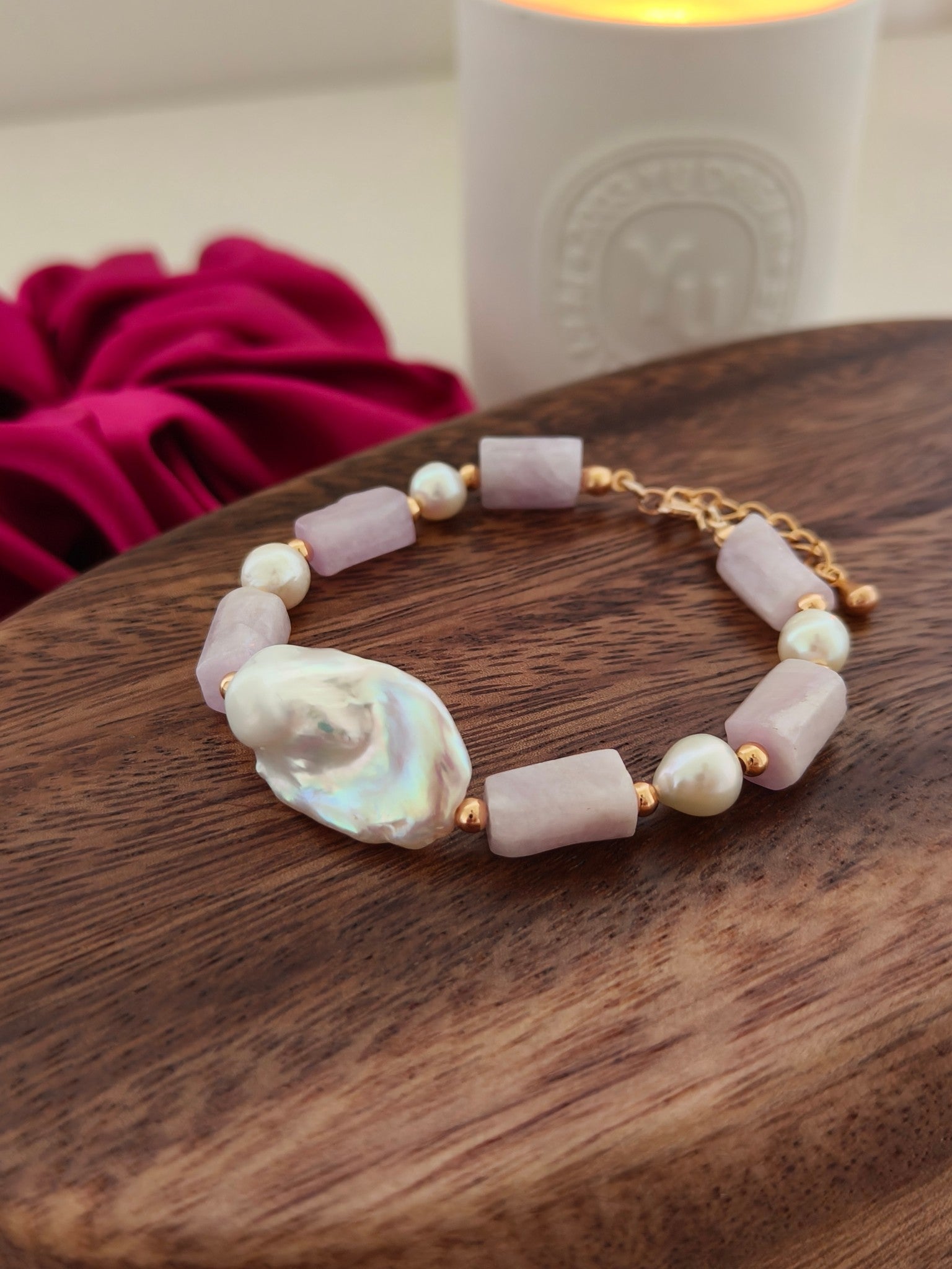 Purple stone and pearl bead bracelet with gold chain, featuring a large baroque pearl