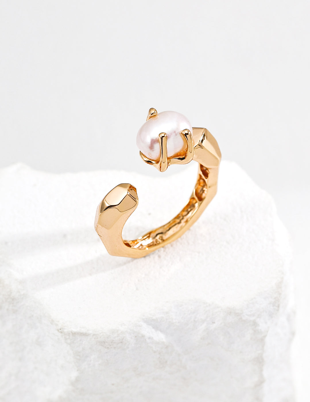 Gold-tone baroque pearl open ring, front view with wrapped band details