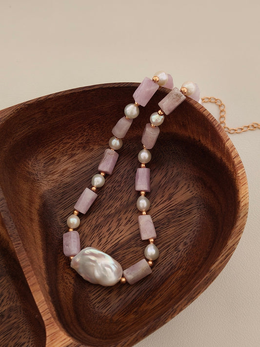 Baroque pearl and kunzite necklace featuring lavender stone bars and white pearls with gold links