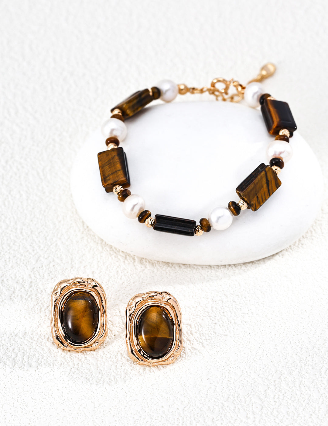 Tiger eye and pearl beaded bracelet with gold-tone chain, shown with matching earrings