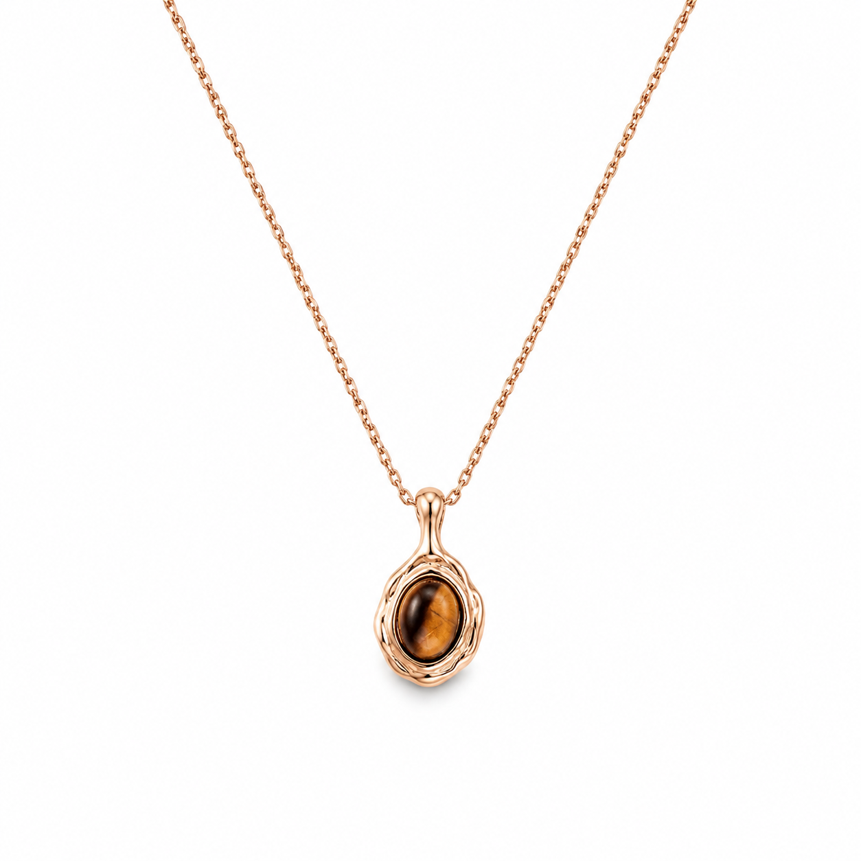 Gold-tone pendant necklace with oval tiger eye stone in scalloped bezel