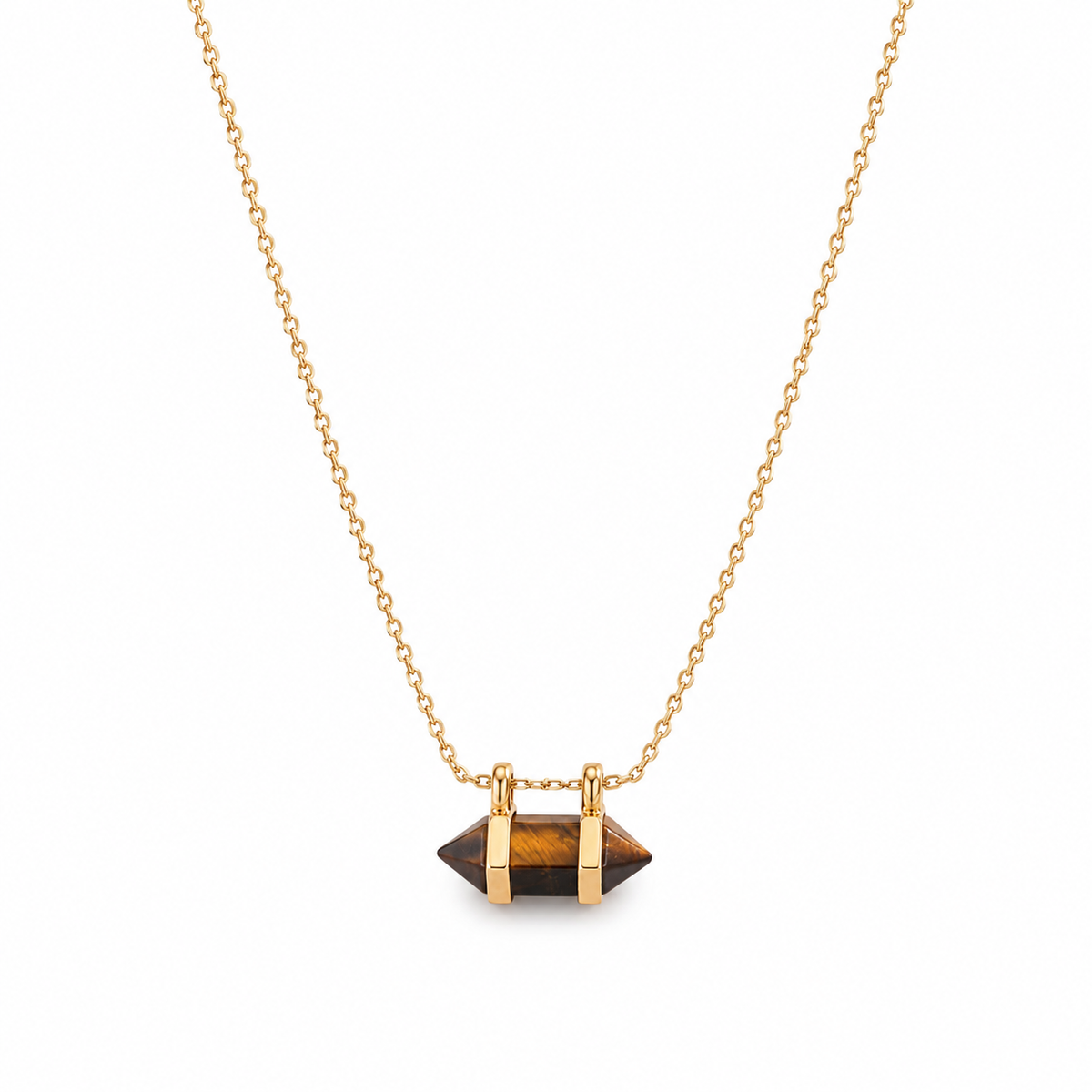 Gold chain pendant necklace with dark geometric stone charm and gold bar details