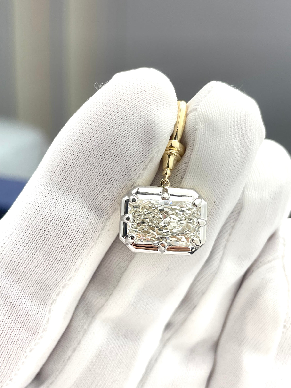 Gold lab diamond pendant with rectangular setting and single center stone