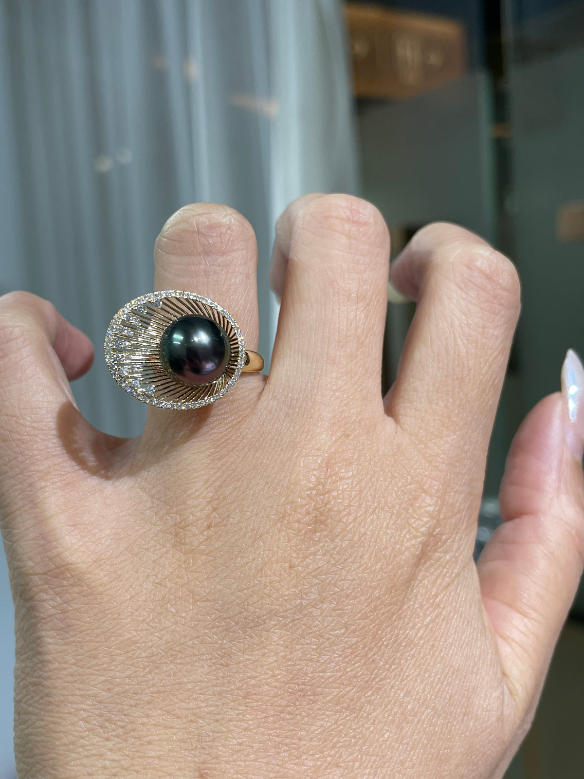 Tahitian pearl halo diamond ring in yellow gold, round dark pearl with pave border